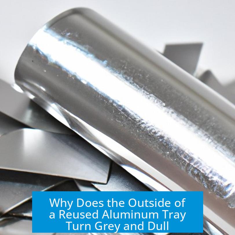 Why Does the Outside of a Reused Aluminum Tray Turn Grey and Dull?